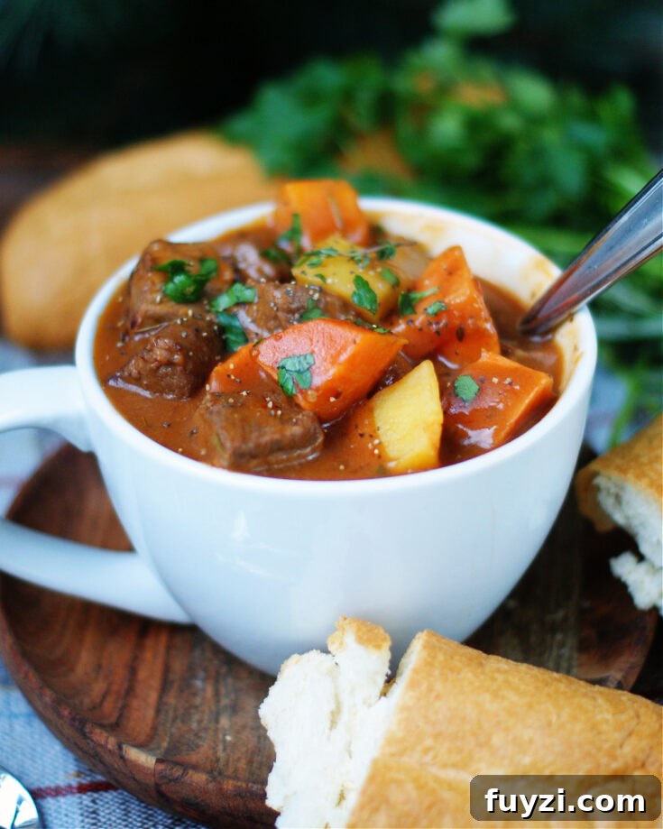 Homemade beef stew with tender chunks of chuck roast, the best beef for stew, and sweet potatoes