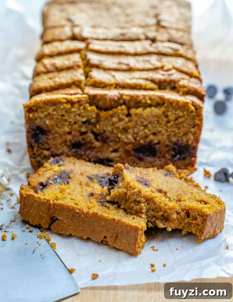 Moist Chocolate Chip Pumpkin Bread Recipe 5 side shot of sliced Chocolate Chip Pumpkin Bread