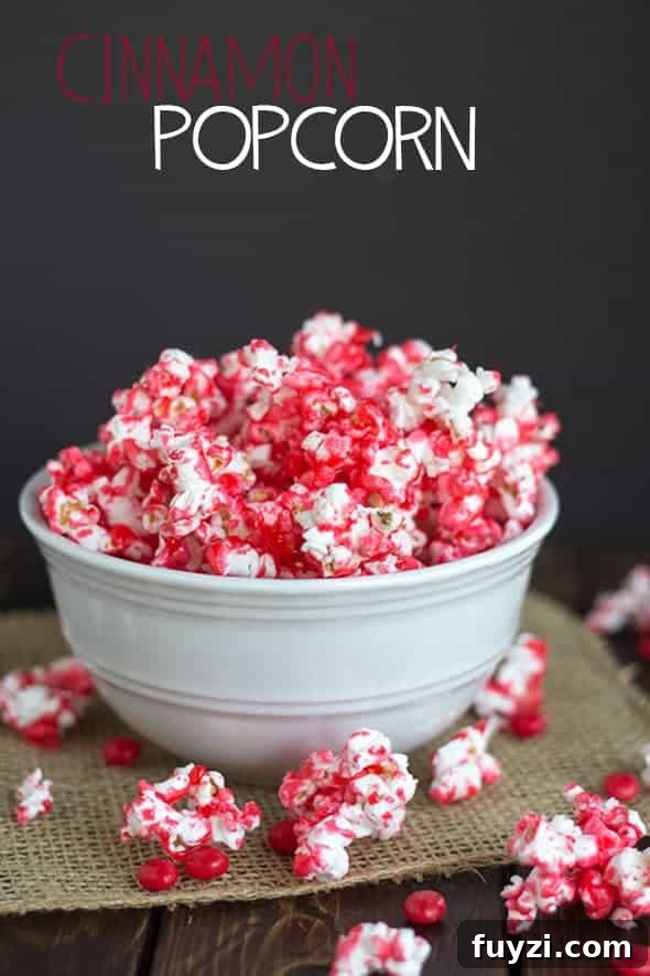 Cinnamon popcorn sprinkled with red and white.