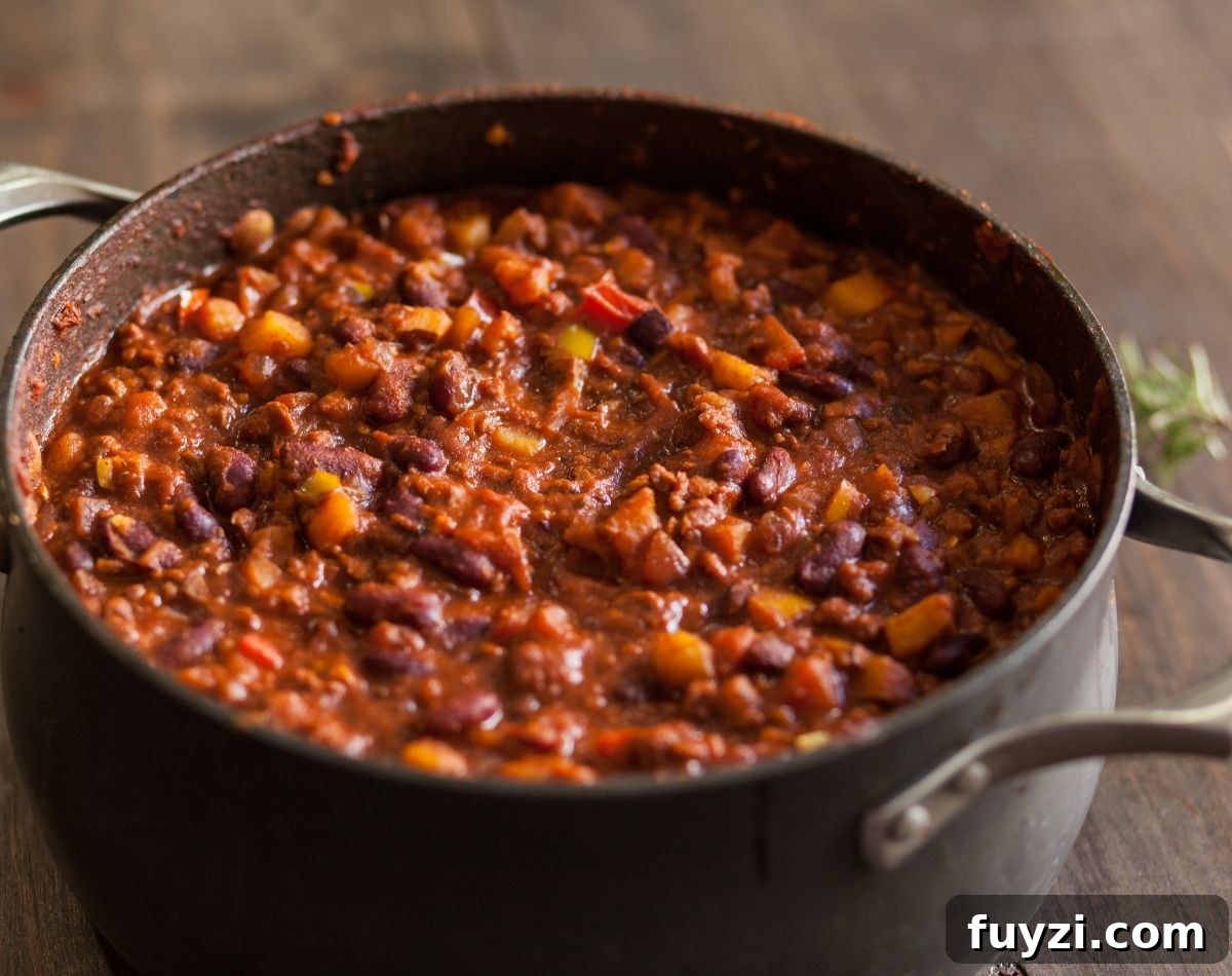 How to Thicken Chili Without Cornstarch or Flour 3 pot of chili with the lid off.