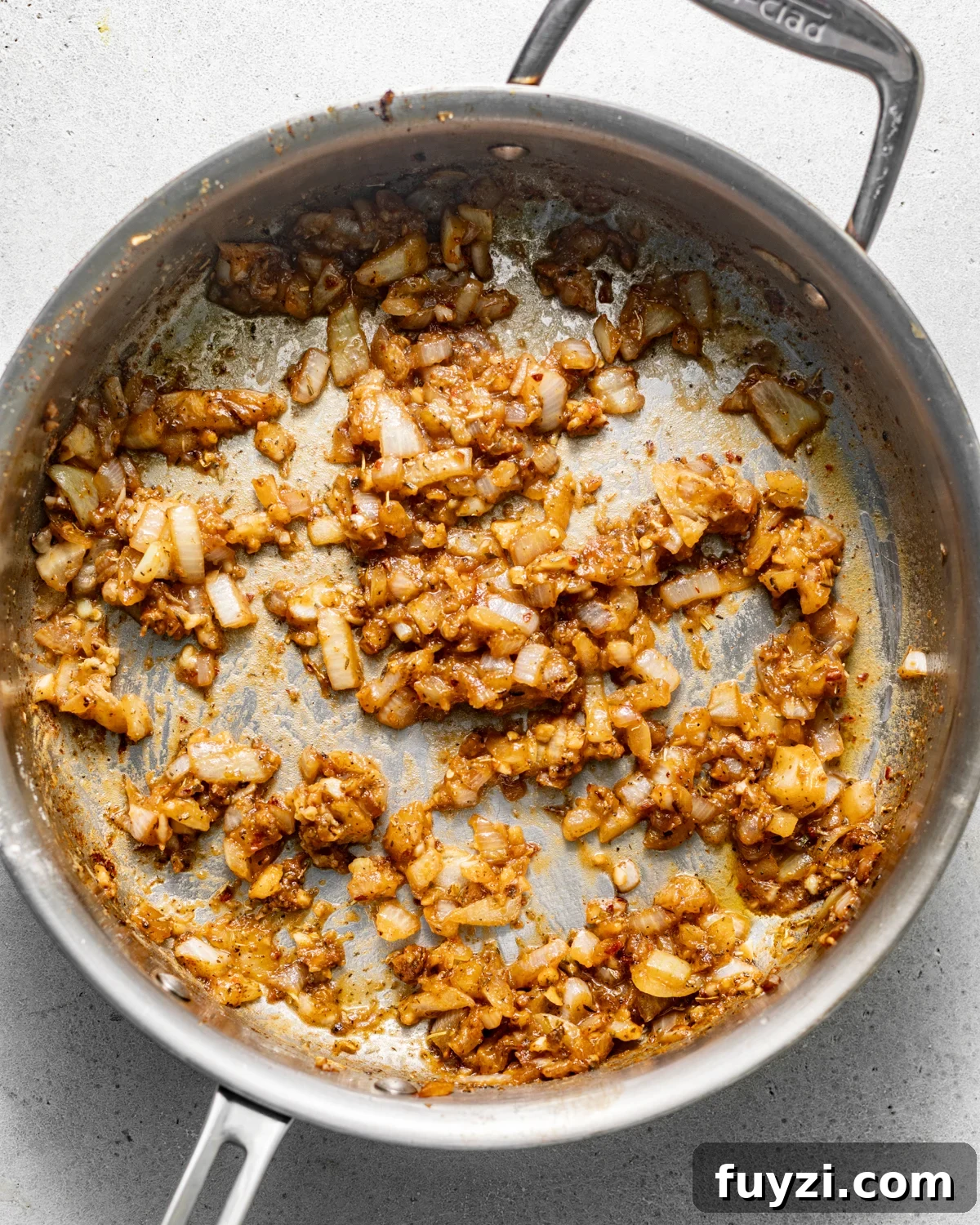sauteed onion, garlic, seasonings, butter, and flour in a skillet.
