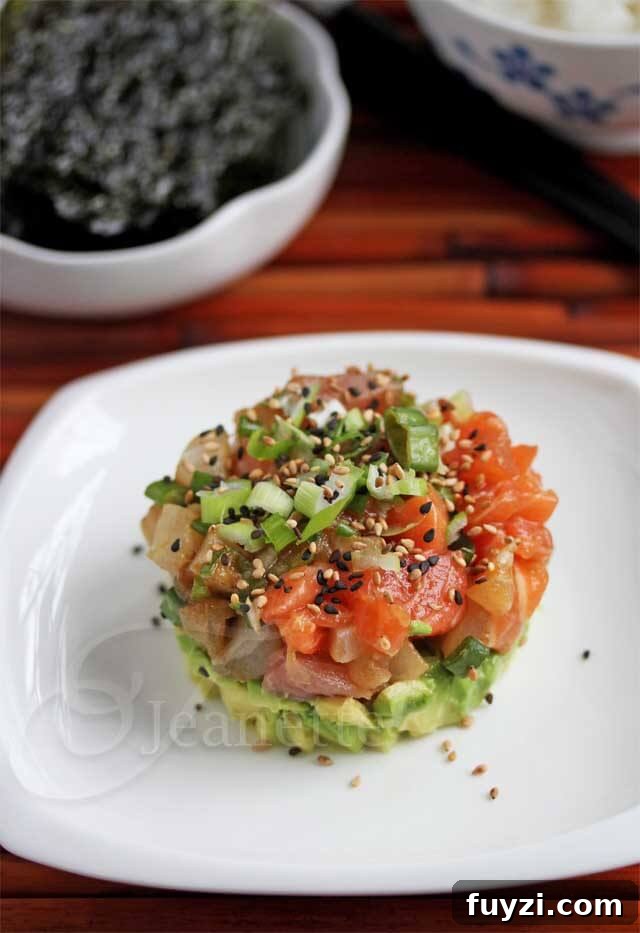 Crispy Spicy Tuna Wonton Cups with Sriracha Mayo 10 Mixed Fish and Avocado Poke Tower