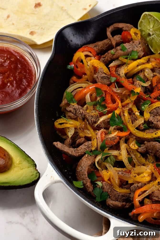 Steak Fajitas Recipe - Steak fajitas make a quick and easy meal perfect for weeknight suppers or weekend celebrations! // addapinch.com