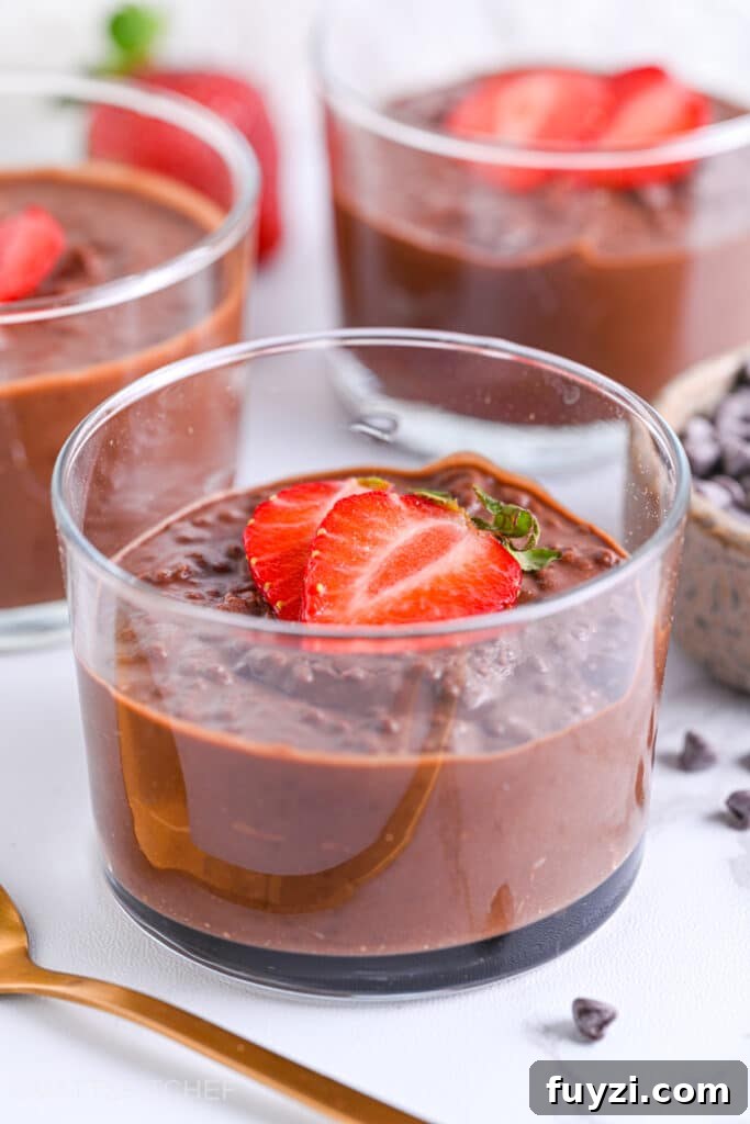 Creamy Chocolate Chia Pudding Recipe 2 Creamy chocolate chia pudding with sliced strawberries