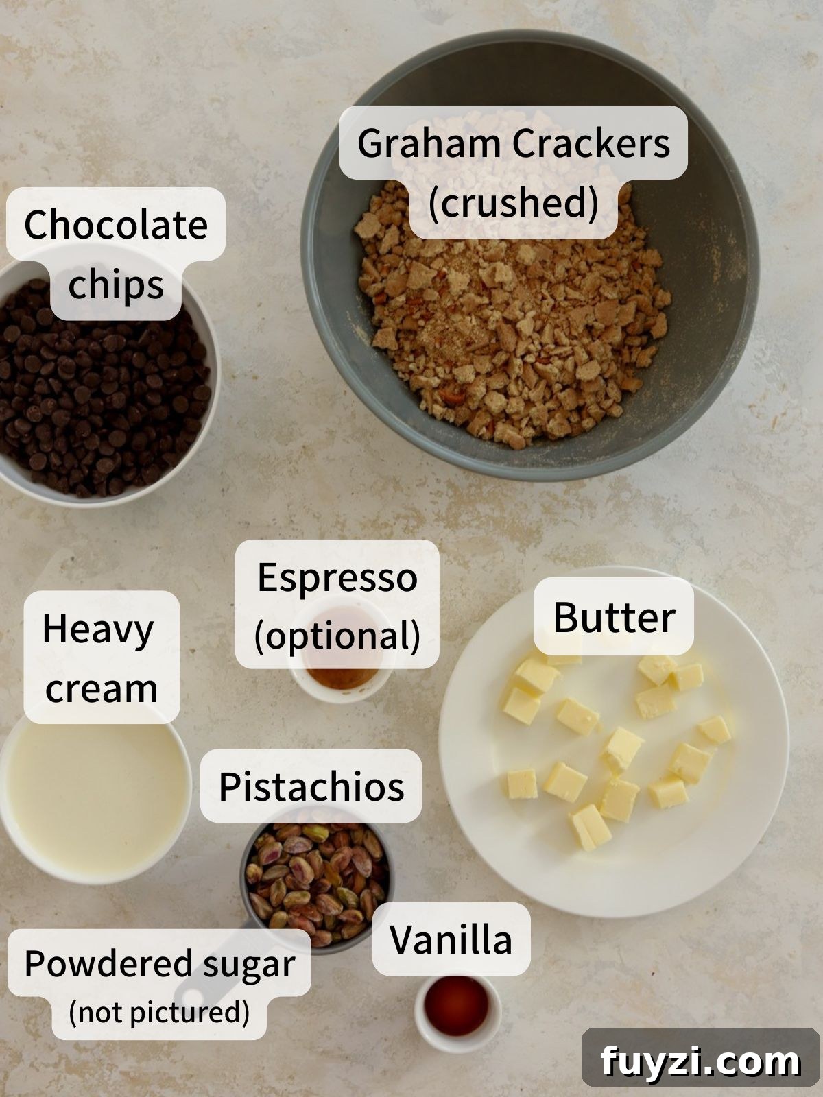 Labeled ingredients for chocolate salami laid out on a table