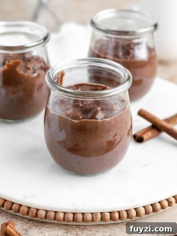 Chocolate rice pudding in glasses