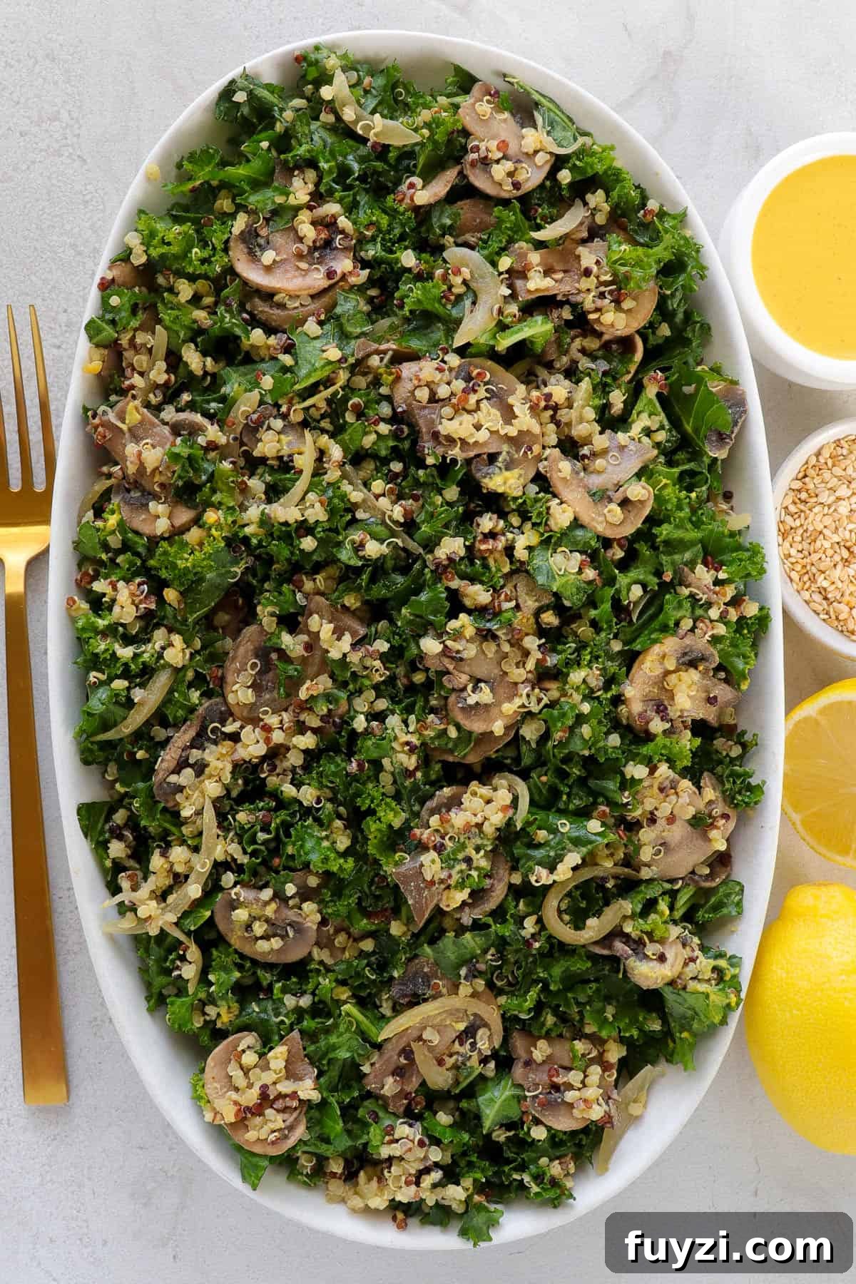 Warm Cheesy Quinoa Salad with Kale and Sauteed Mushrooms 3 Warm salad without dressing poured over the top.