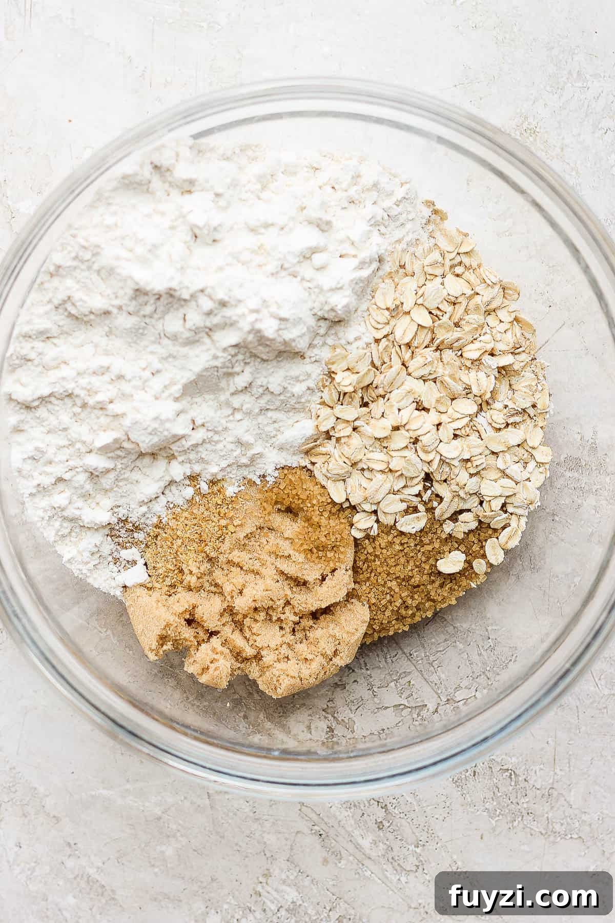 The dry ingredients in a large glass bowl.