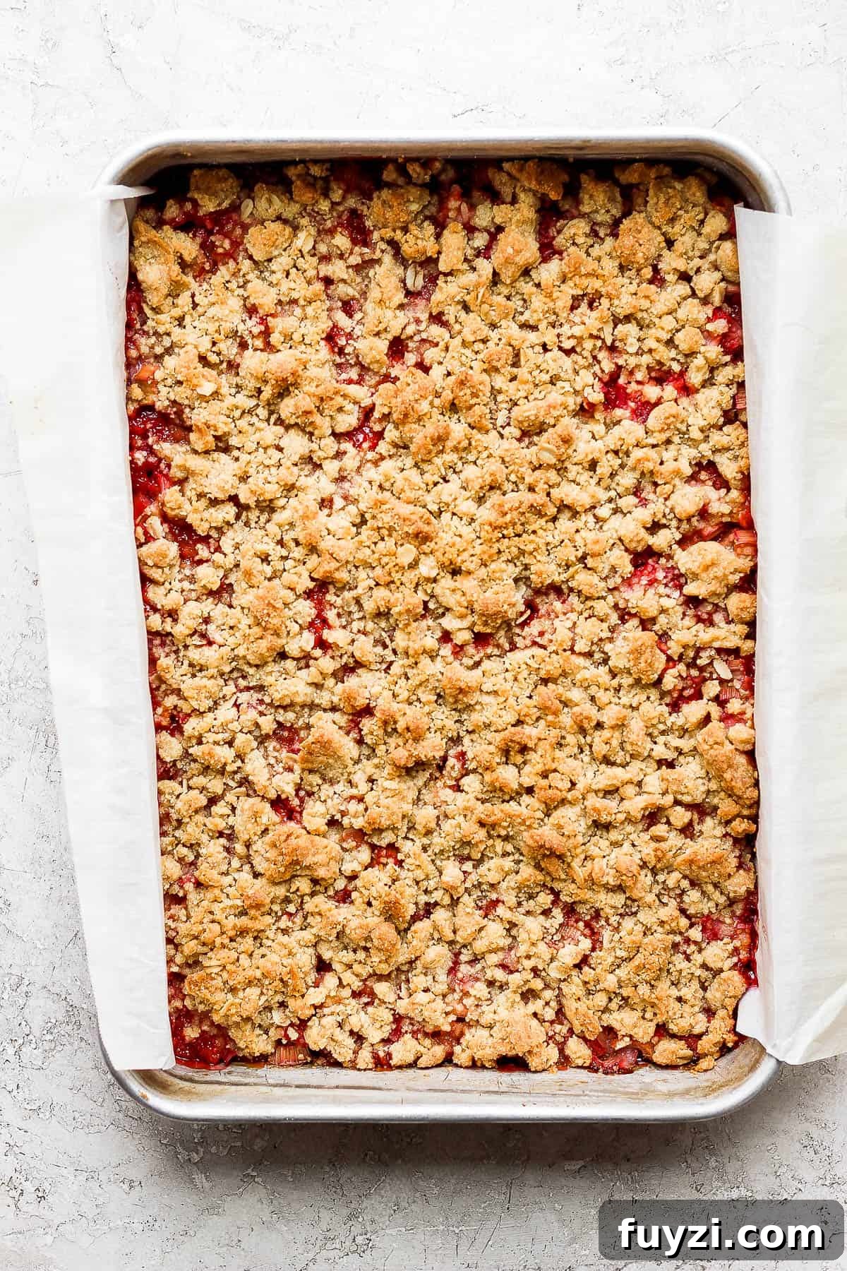 The strawberry rhubarb bars in the pan after baking.