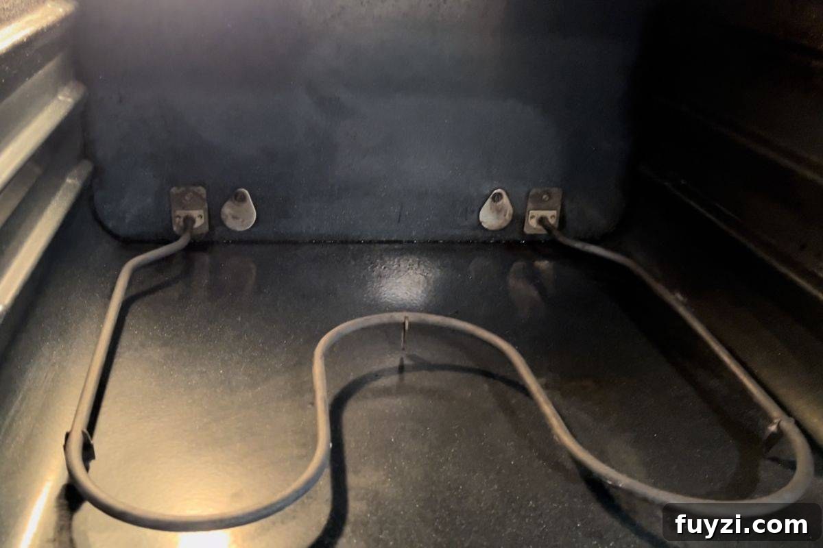 Inside view of an empty oven, after cleaning.