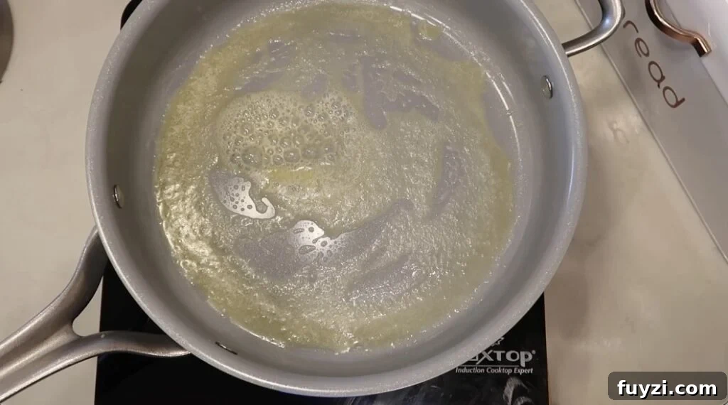Silky Garlic Cream Sauce Recipe for Pasta and Chicken 4 Butter melted in sauté pan