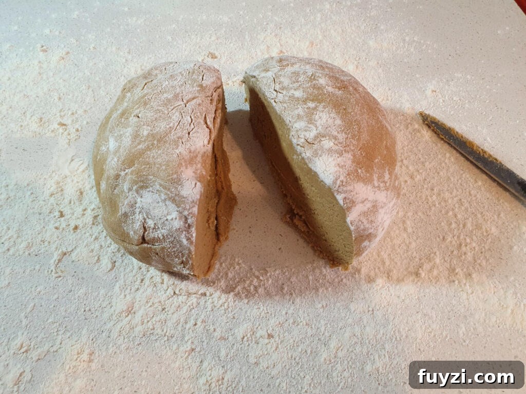 cutting shaped dough in half.