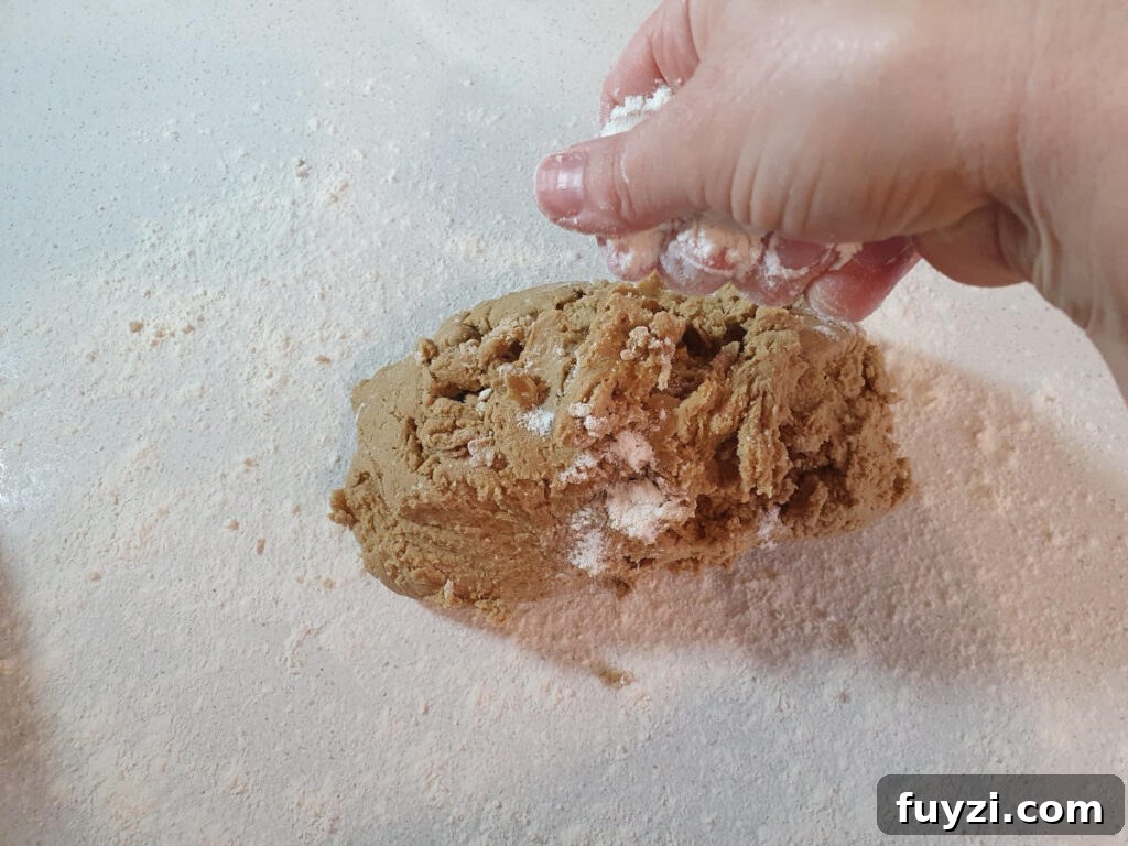 sprinkling dough with flour to prevent sticking when rolling out.