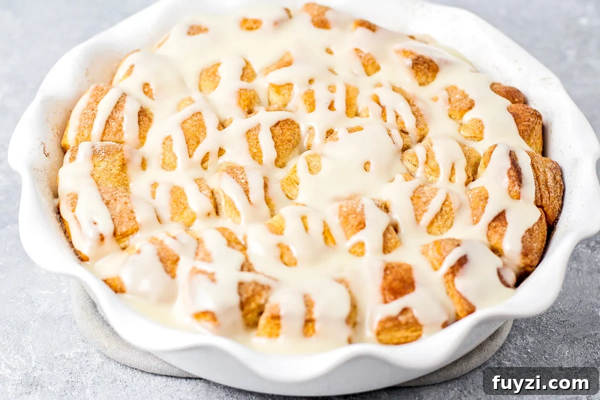 Delicious cinnamon bites deliver all the gooey, sweet cinnamon flavor you crave in just 30 minutes, thanks to a canned biscuit shortcut! Cinnamon bites drizzled with glaze.