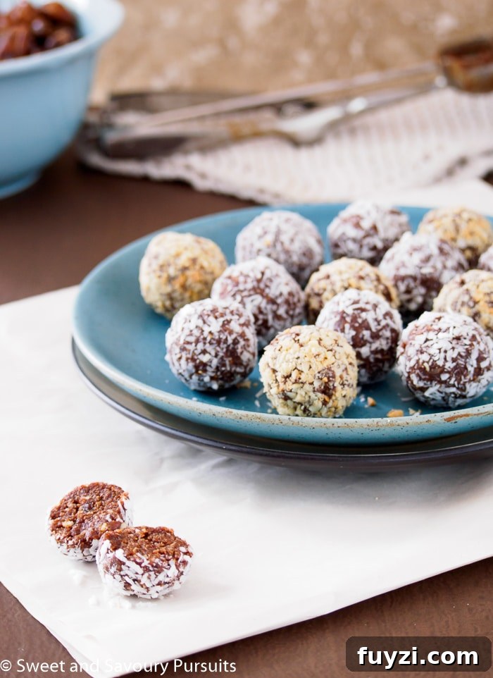 5-Ingredient Date Energy Balls Recipe: No-Bake Snack 2 5 Ingredient Date Energy Balls on a plate.