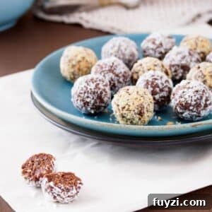 5-Ingredient Date Energy Balls Recipe: No-Bake Snack 5 Energy balls made with dates and peanut butter on dish.