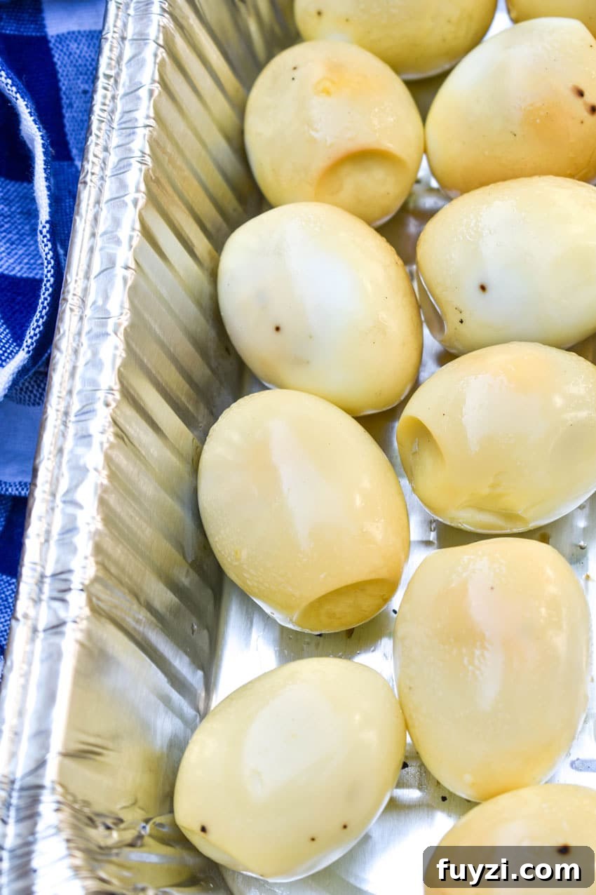 Smoked Egg Salad Recipe for Sandwiches and Salads 5 smoked hard boiled eggs in an aluminum pan