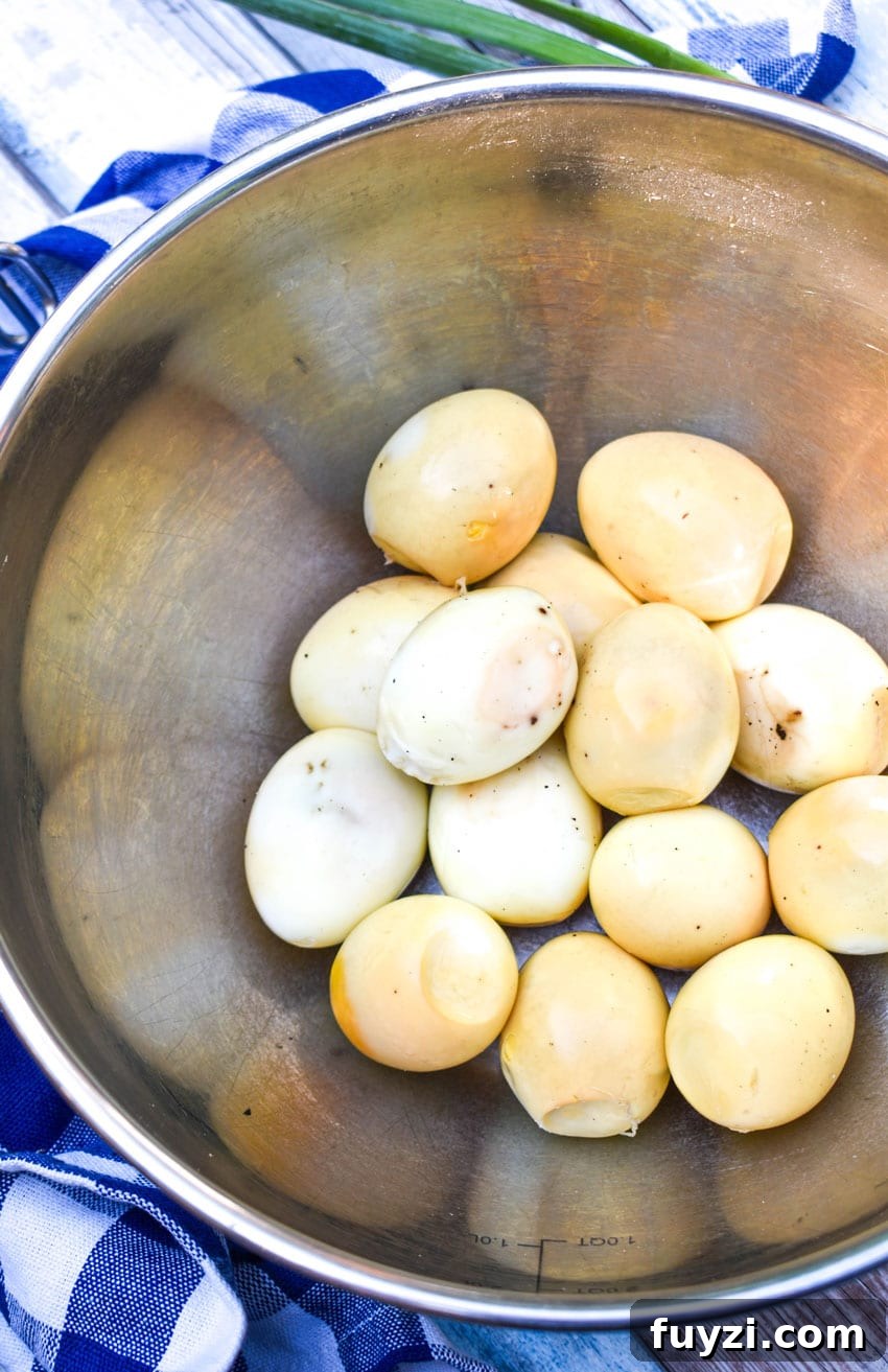 Smoked Egg Salad Recipe for Sandwiches and Salads 6 peeled smoked hard boiled eggs in a large metal mixing bowl