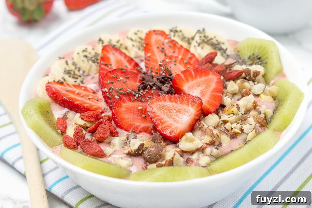 Strawberry Ginger Smoothie Bowl closeup - healthy breakfast idea.