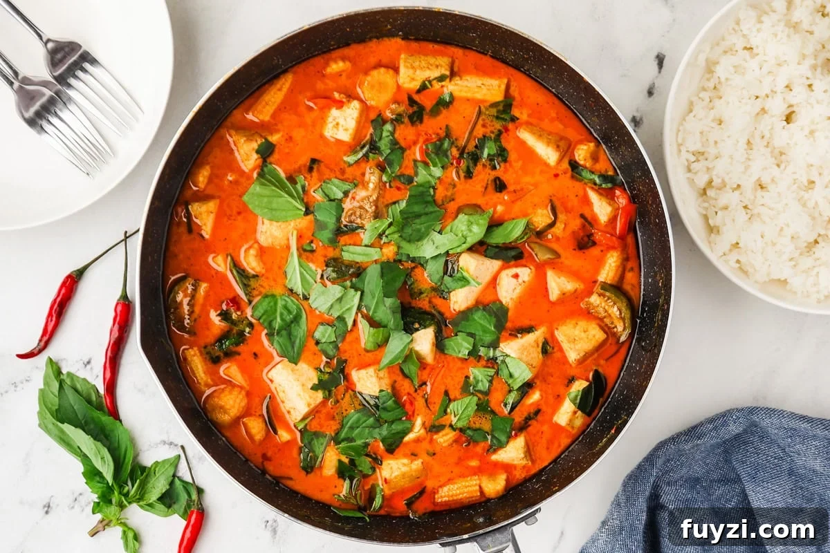 An overhead image of Thai red curry in a skillet.