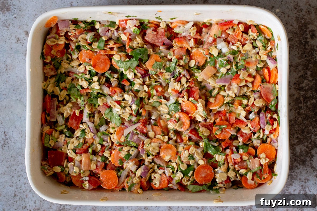 Savory Vegan Baked Oats with Roasted Vegetables 10 savory baked oats mixed up in the pan before baking