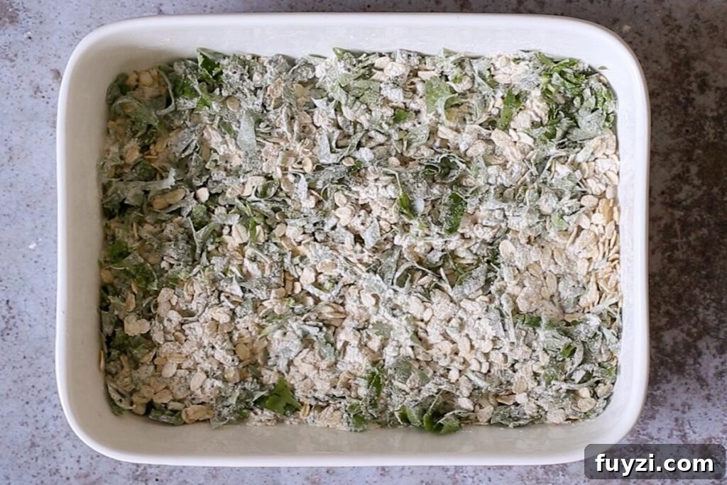 Savory Vegan Baked Oats with Roasted Vegetables 8 oats, flour, seeds, and cilantro in the baking pan after mixing