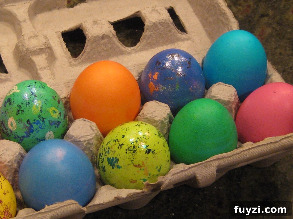 Buffalo Deviled Eggs - use your leftover dyed Easter eggs to make easy and flavorful deviled eggs with hot sauce and blue cheese! | fedandfulfilled.com