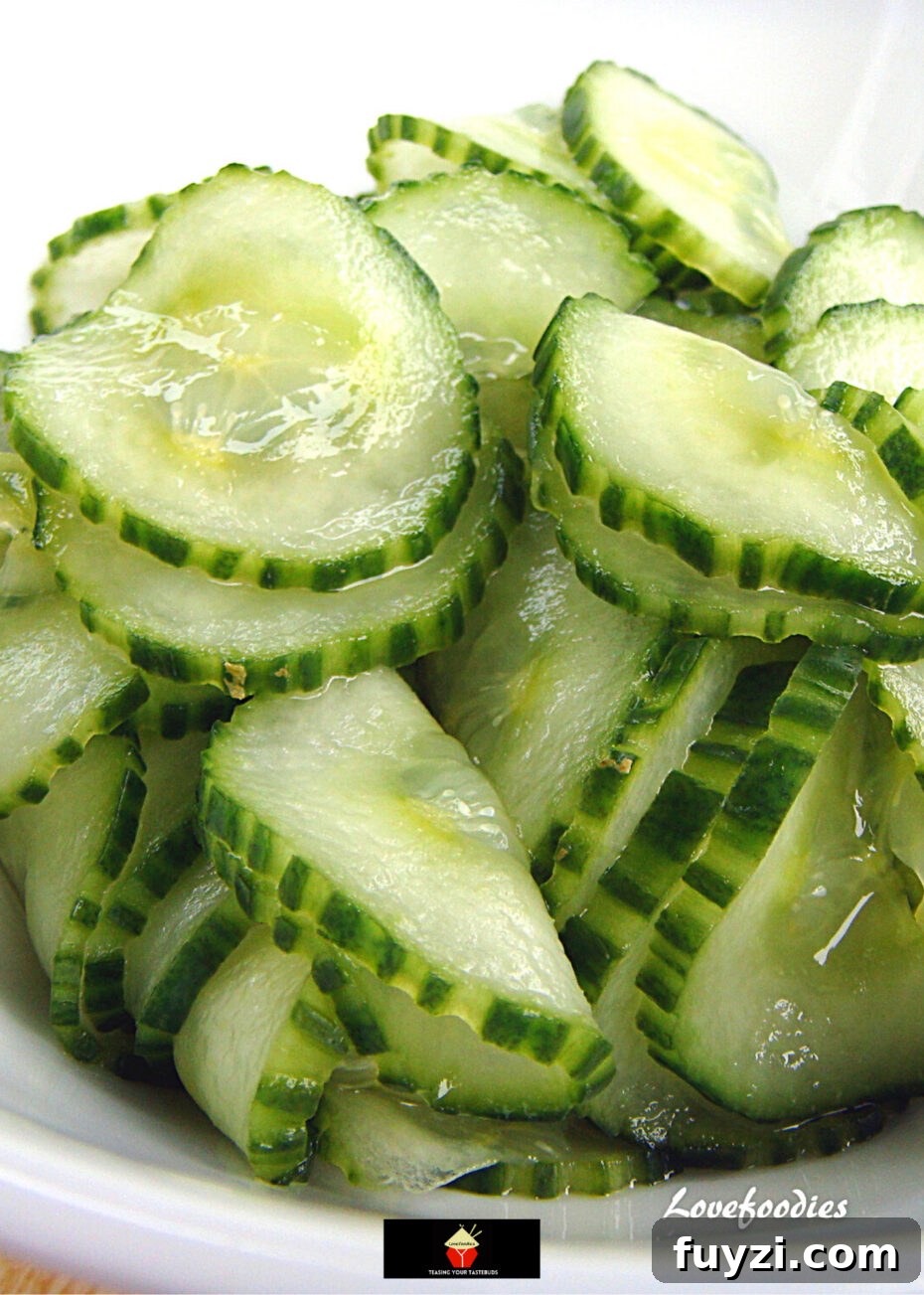 Cucumber Salad Recipe with Dill and Red Onion 4 Bowl of chilled cucumber salad ready to serve.