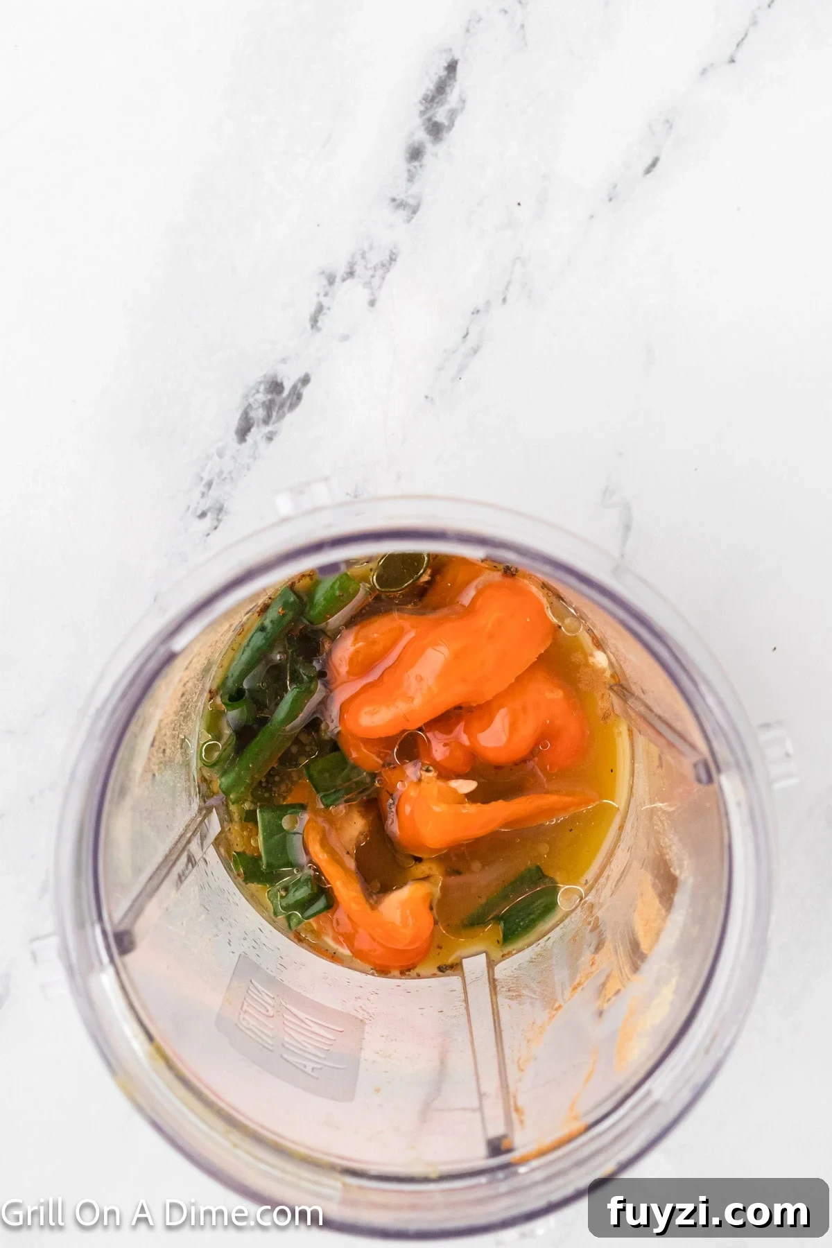 Marinade ingredients added to the blender