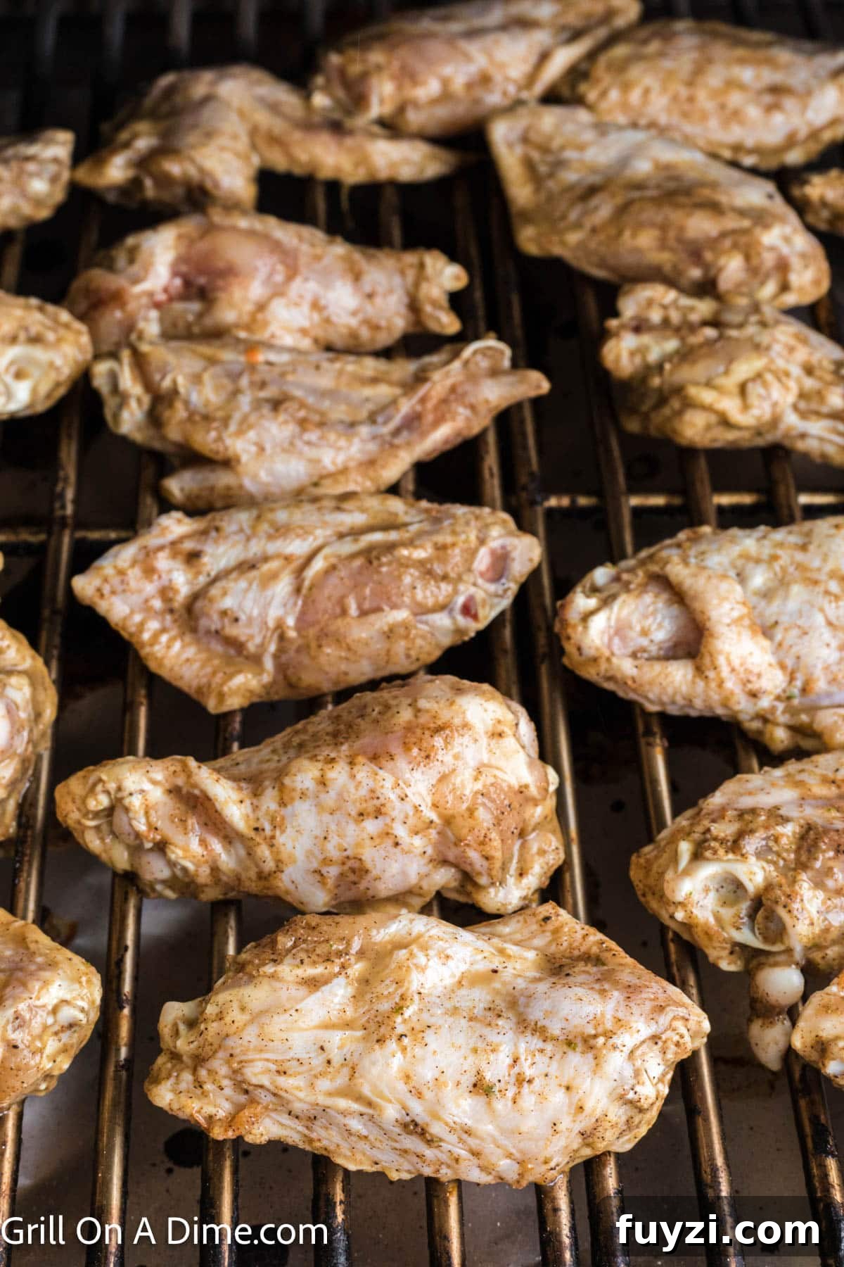 Placing the chicken wings on the grill