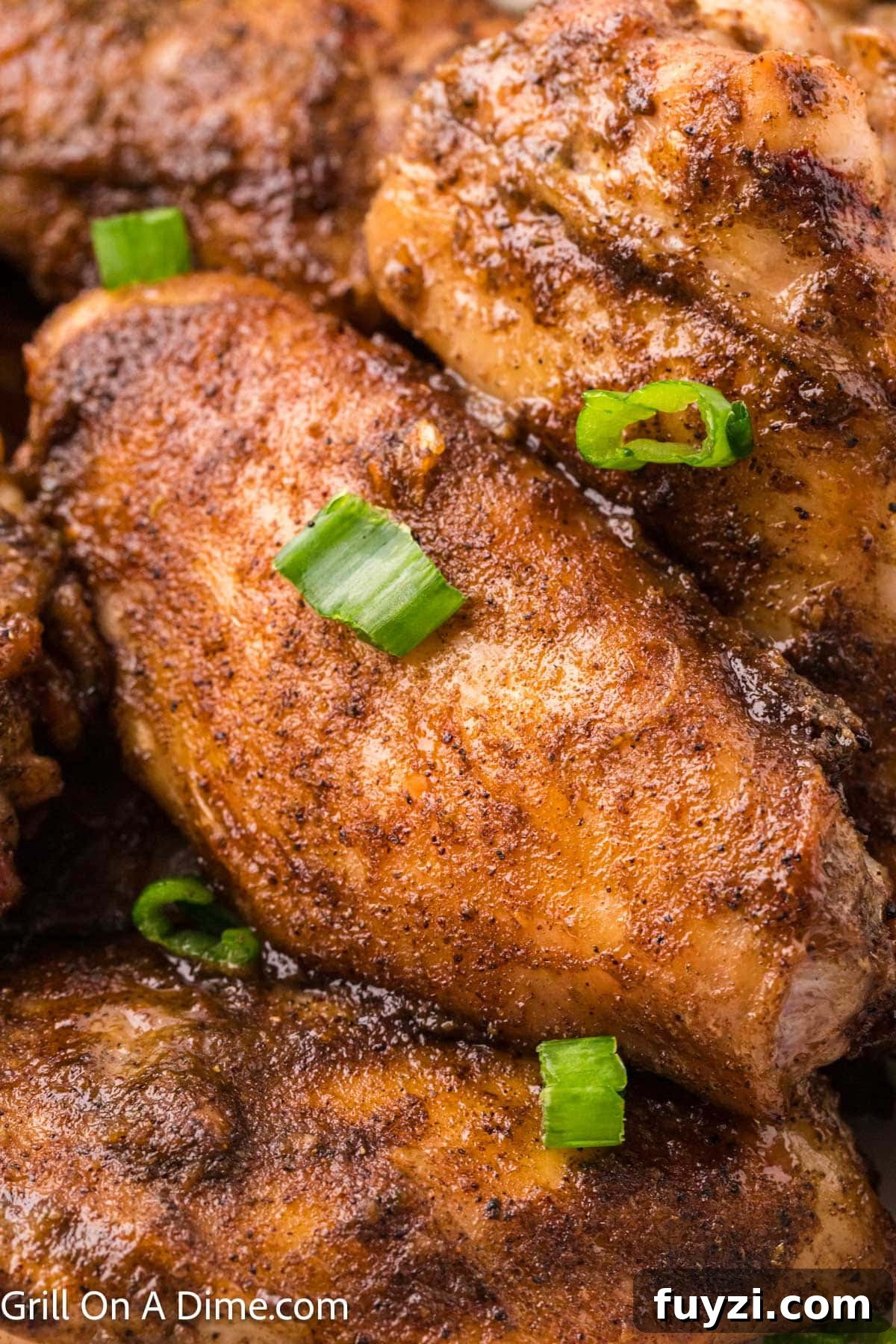 Jerk Chicken Wings topped with green onions