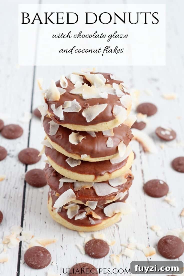 Baked Mini Donuts Recipe with Chocolate Glaze 8 baked donuts with chocolate glaze stacked on each other