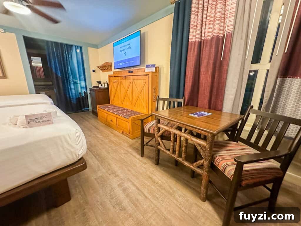 Murphy Bed and dining table in a standard room.