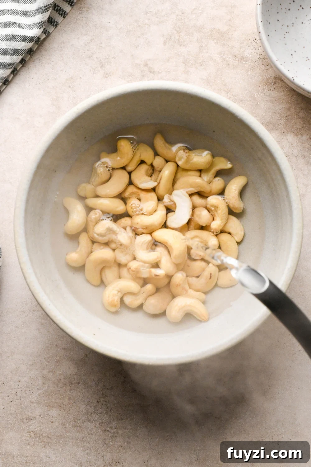 Soaking cashews in hot water