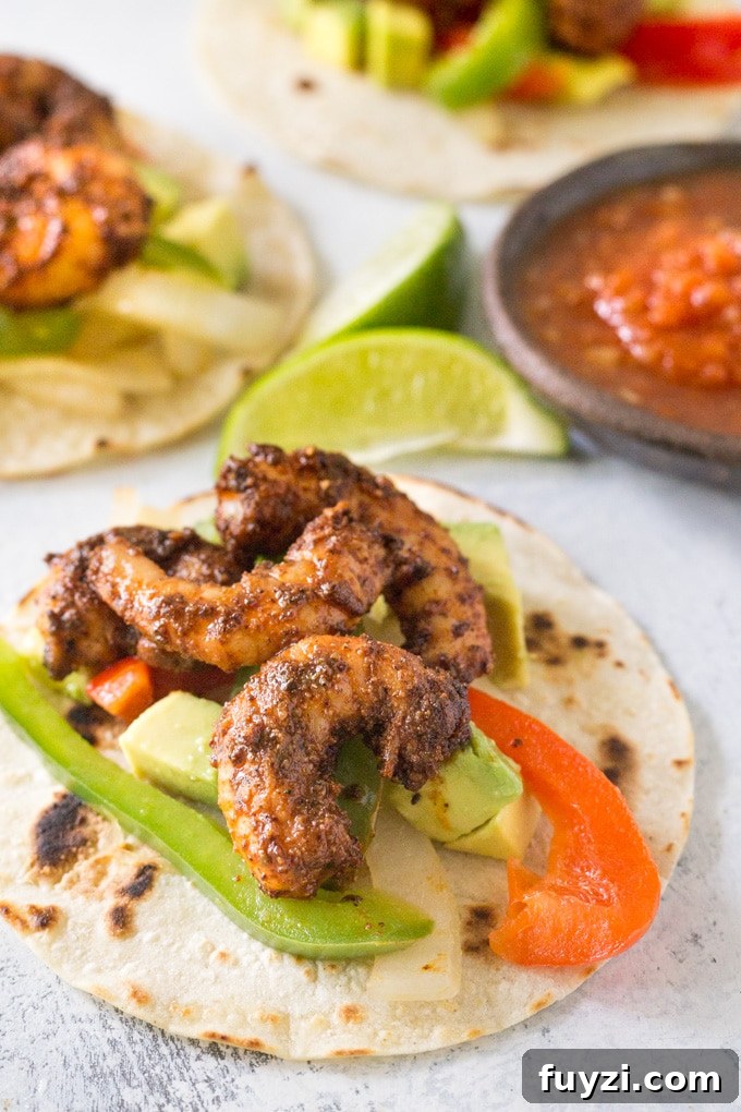 Shrimp fajitas on a table.