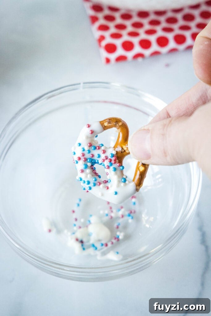 white chocolate covered pretzels with sprinkles