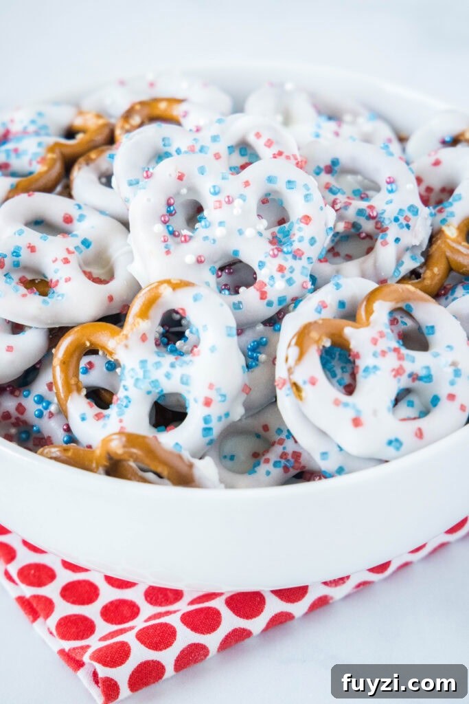 a white bowl with patriotic pretzels piled inside