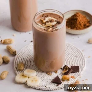 Chocolate peanut butter protein smoothie with bananas and peanut butter.