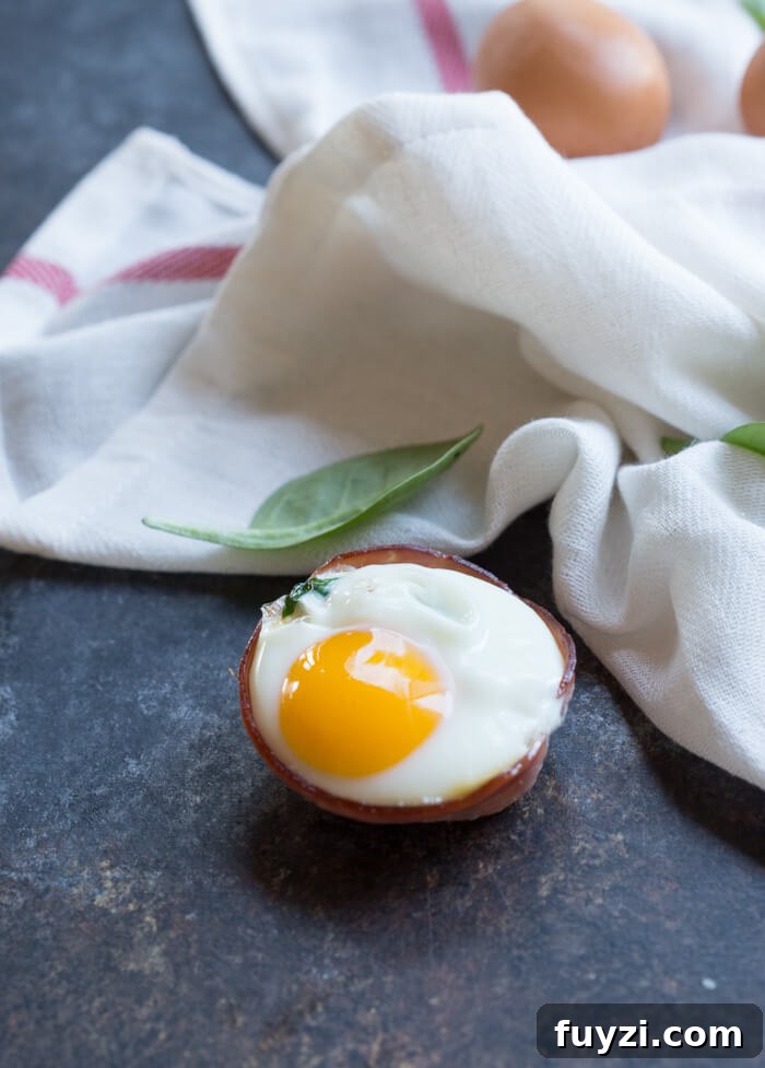 Ham Spinach Egg Cups are an easy meal prep that is high in protein and low carb. Simply bake in a muffin tin to have a healthy breakfast at the ready... made with only 4 ingredients! 