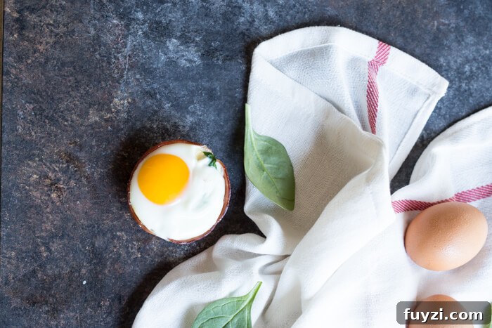 Ham Spinach Egg Cups are an easy meal prep that is high in protein and low carb. Simply bake in a muffin tin to have a healthy breakfast at the ready... made with only 4 ingredients! 