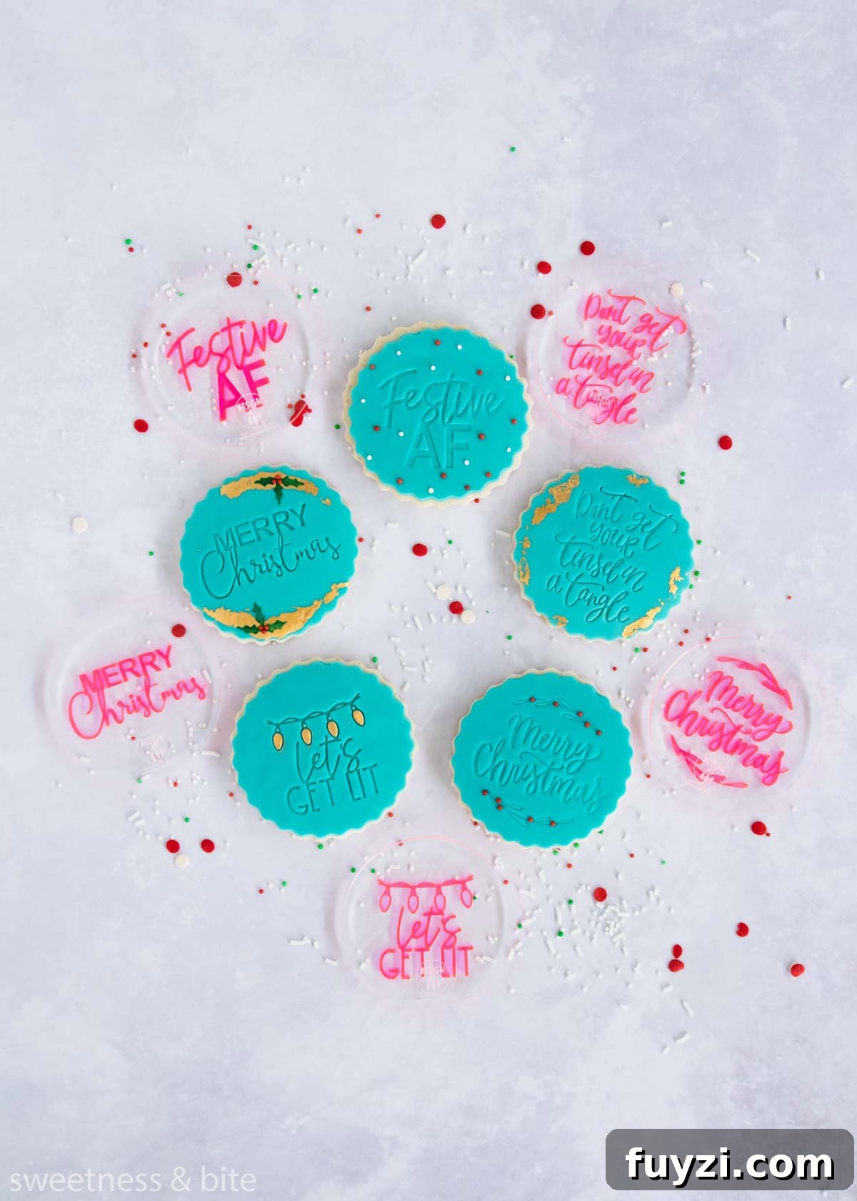 How to Make Soft Gluten-Free Sugar Cookies 5 Round cookies decorated with teal fondant circles embossed with messages.