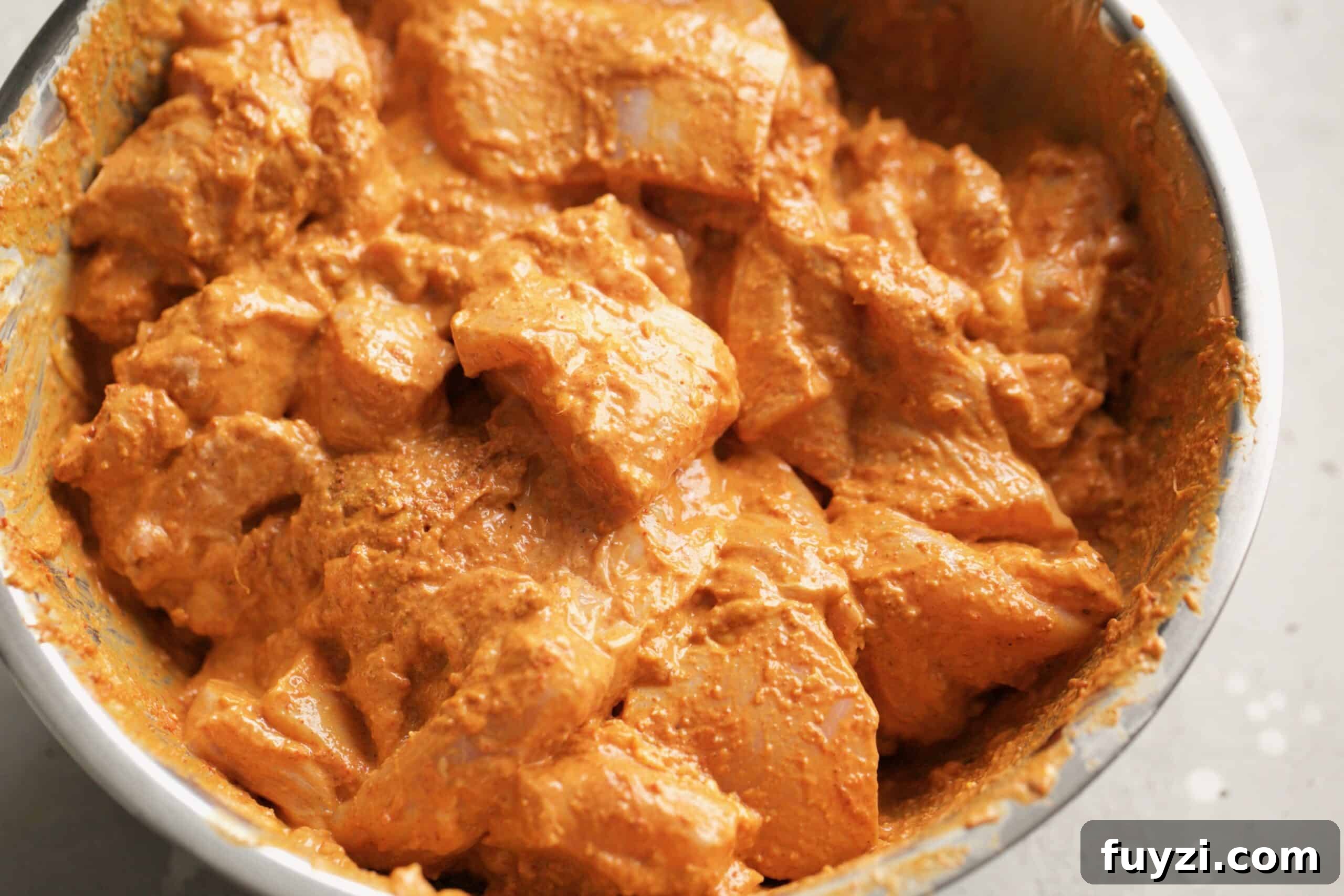 butter chicken covered in mix before cooking