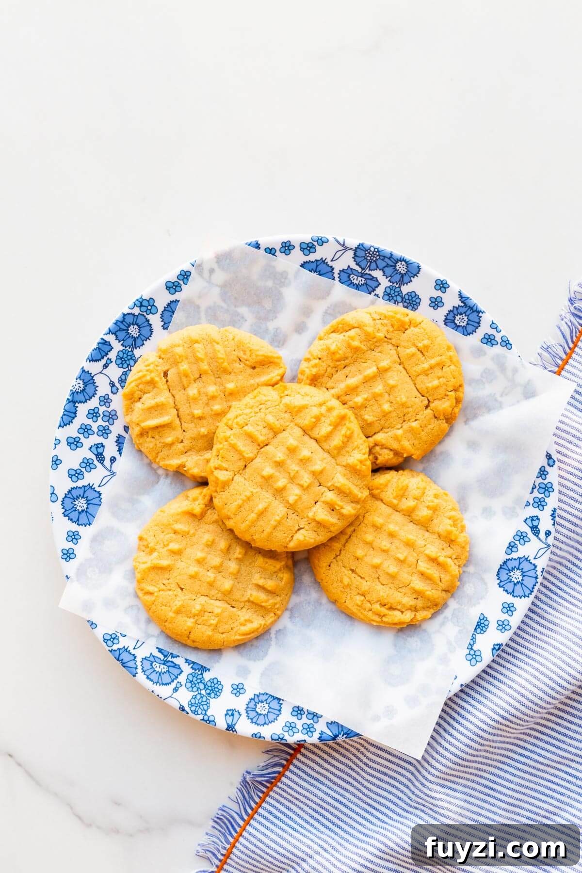 Classic Peanut Butter Cookie Recipe with Natural Peanut Butter 2 A plate of classic peanut butter cookies.