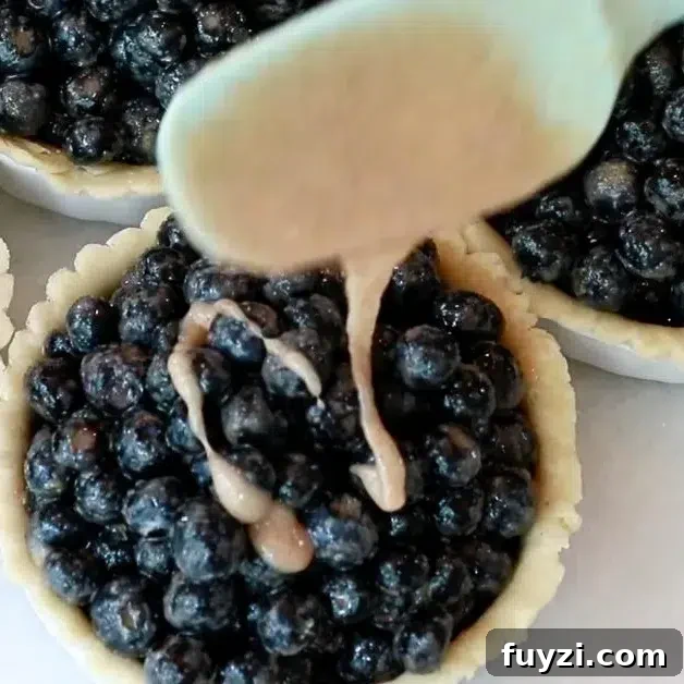 adding left liquids to blueberry pie filling