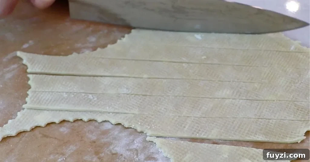 cutting pie dough into stripes