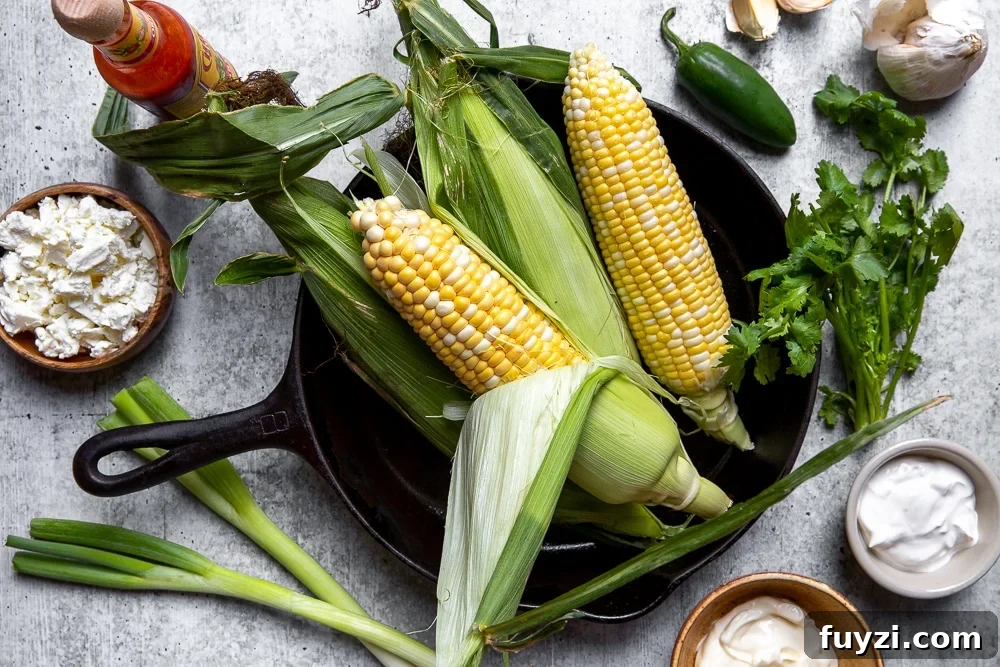 Ingredients assembled on counter to make elote dip.