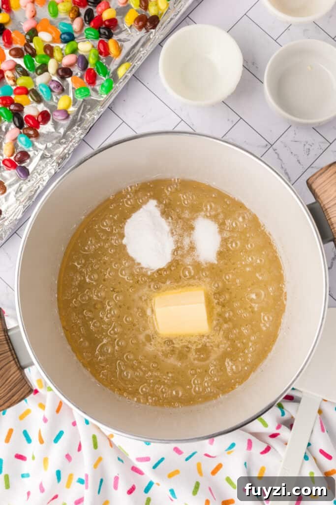 butter, baking soda, and salt added to the sugar mixture