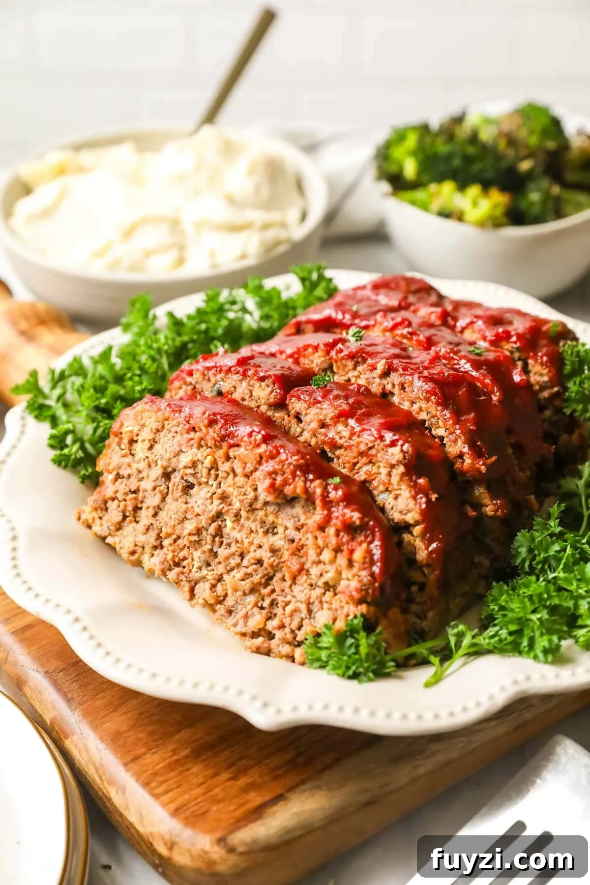 Slices of meatloaf topped with a homemade glaze.
