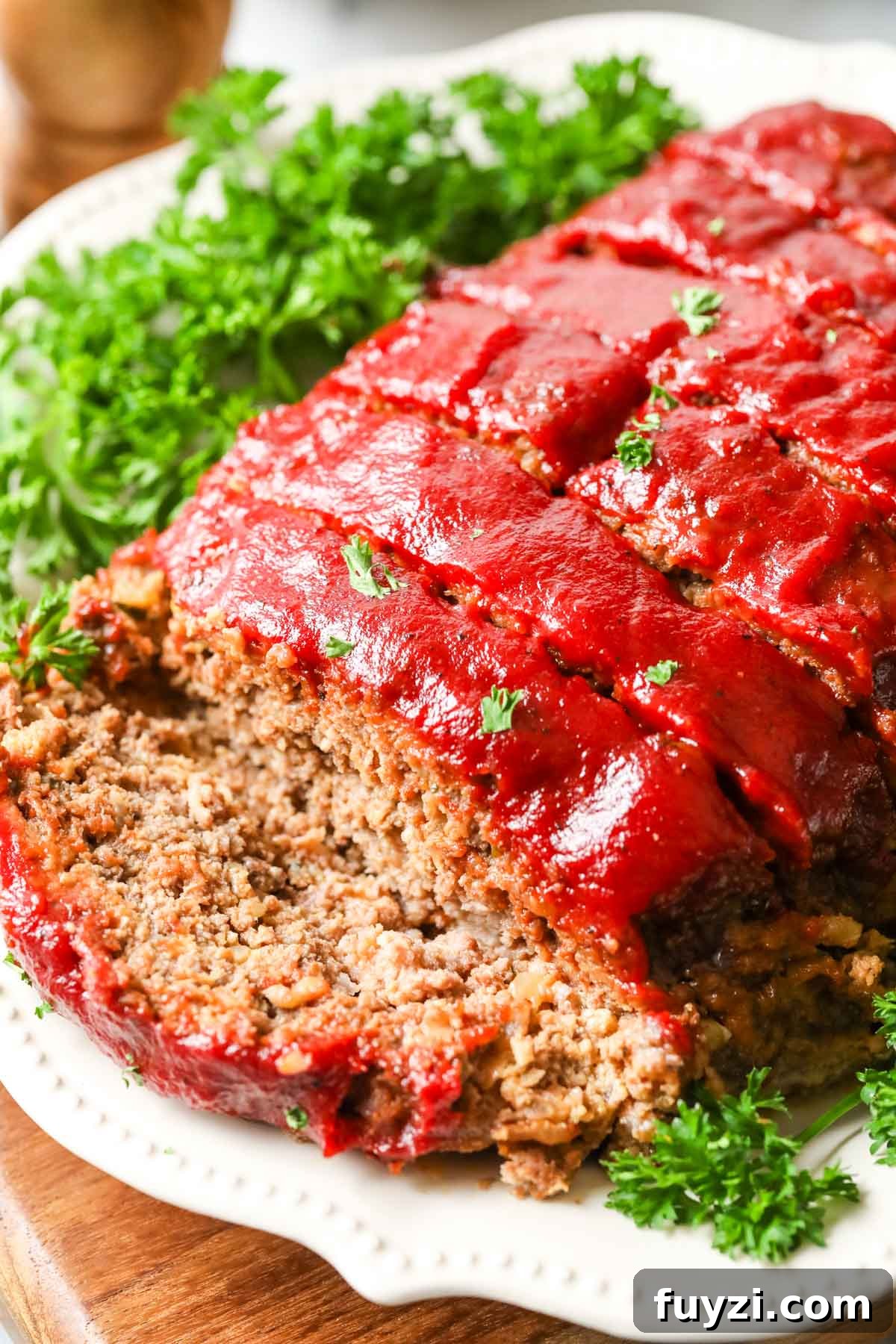 Slices of meatloaf topped with a homemade glaze.