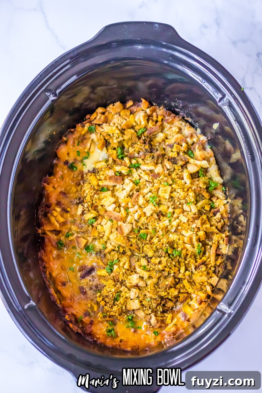Slow Cooker Chicken Cordon Bleu Recipe with Ham and Swiss 8 finished slow cooker chicken cordon bleu casserole in the slow cooker